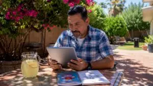 Man researching HVAC services at home